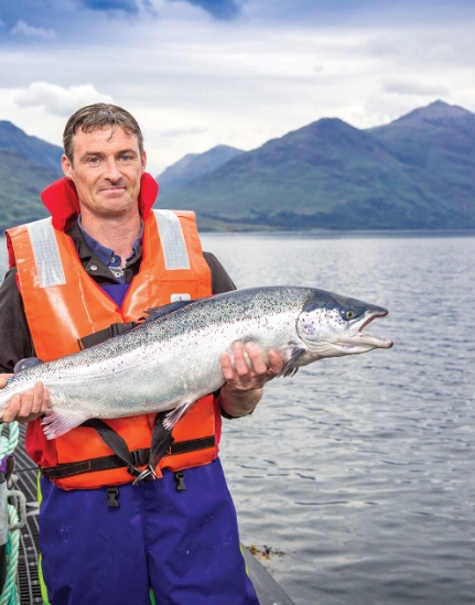 Man holding Scottish Salmon